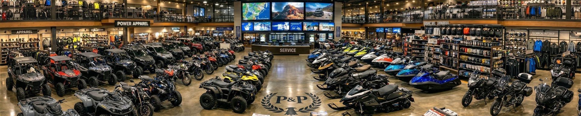 An image shot within a large warehouse containing many ATVs and power sports accessories